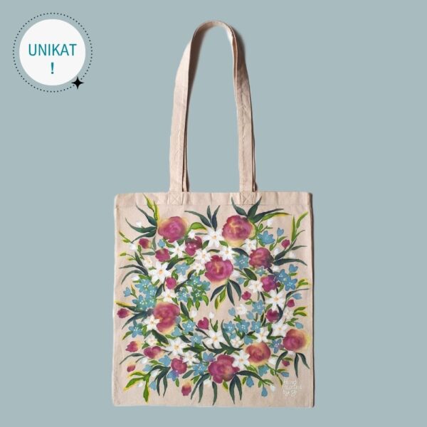 Torba bawełniana w kolorze naturalnym z ręcznie namalowanym motywem kwietnym - róże, margerytki i niezapominajki kaukaskie w otoczeniu zieleni gałązek